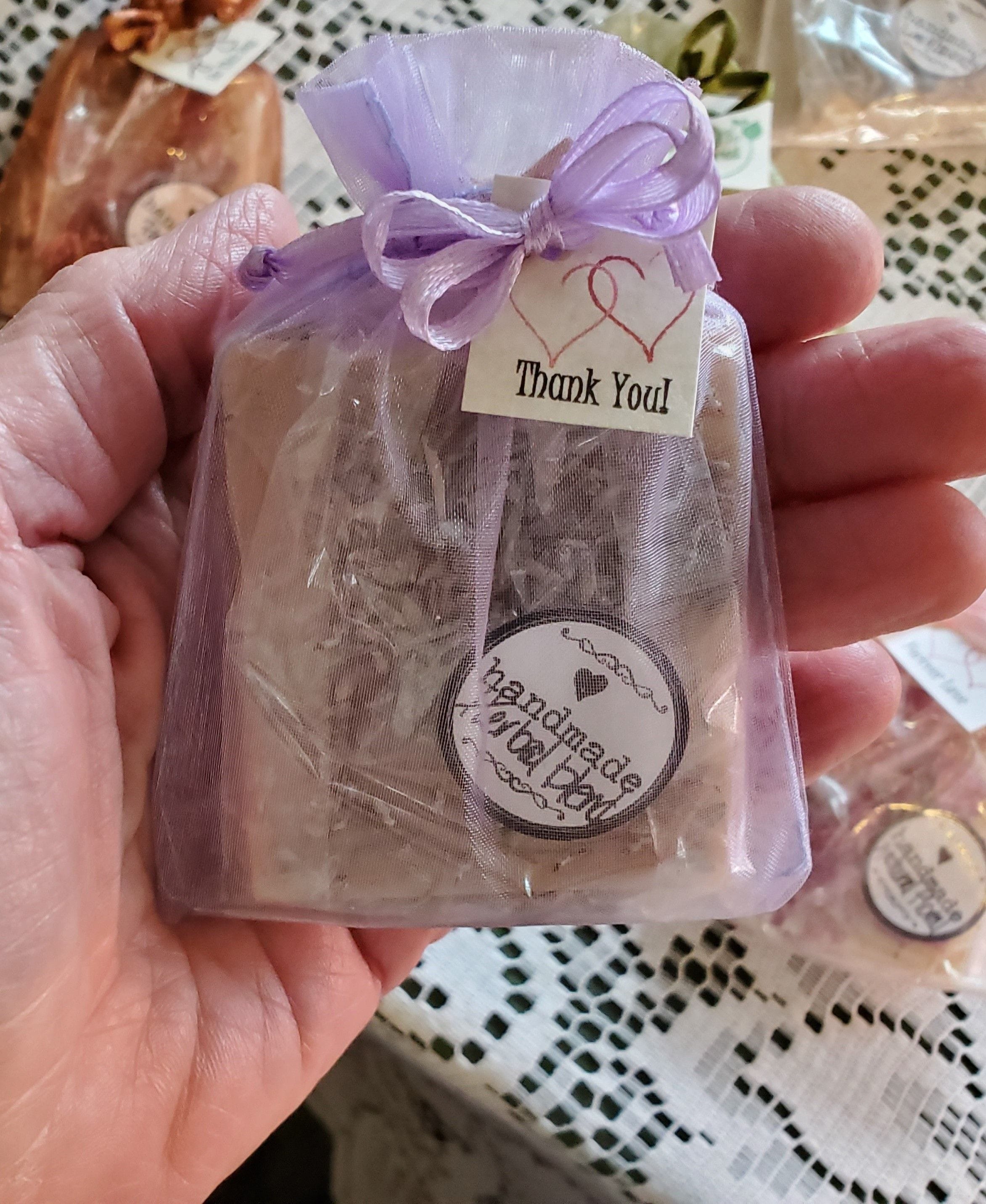 These cute, inexpensive Bridal Shower soap favours are made with small batch all natural soap and decorated with organic flower petals.  Beautiful presentation.