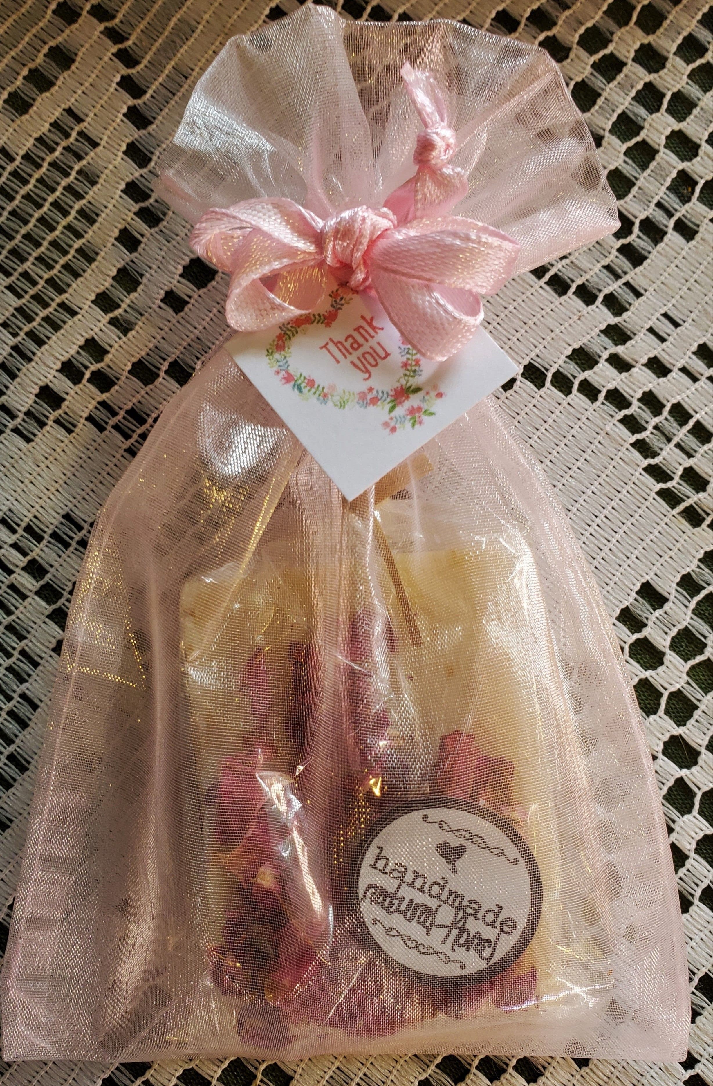 This premium soap favour is a beautiful blend of natural floral essential oils decorated with organic rose petals.  A beautiful and useful gift for your wedding